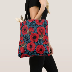 Rode klaprozen en wratten, blauwe bladeren op zwar tote bag
