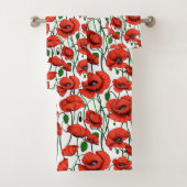 Rode klaprozen in een veld op wit bad handdoek (Insitu)