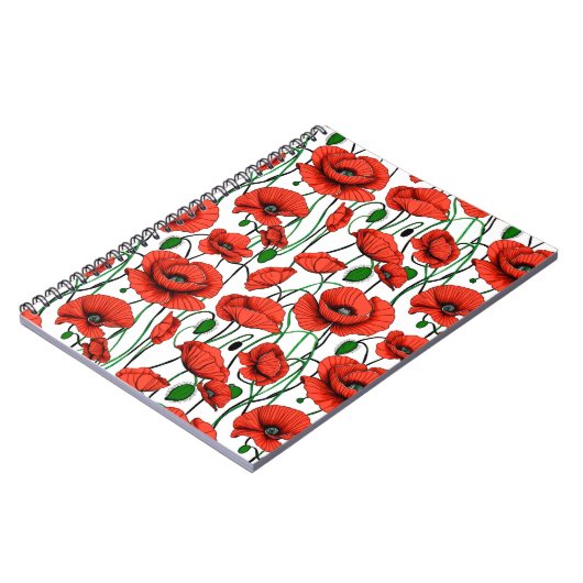 Rode klaprozen in een veld op wit notitieboek (Linkerzijde)