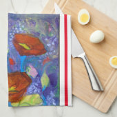 Rode klaprozen op blauwe keukenhanddoek (Quarter Fold)