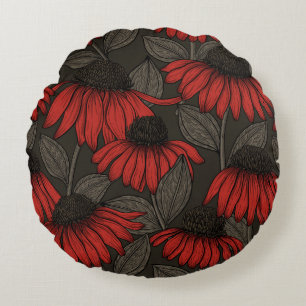 Rode komkommers op bruin rond kussen