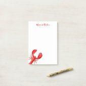 Rode kreeft, witte naam post-it® notes (Op bureau)