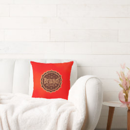 Rode kussen met een decoratief logo