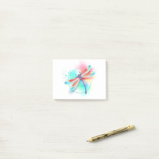 Rode libel op waterverf achtergrond post-it® notes (Op bureau)