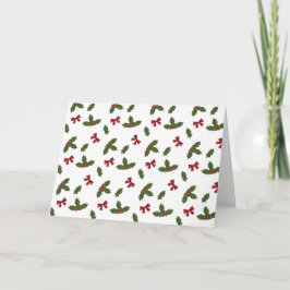 Rode linten en kerst hulst planten patroon & tekst feestdagen kaart