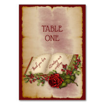 Rode mousserende Rozen op goudkleurige bijbelpagin