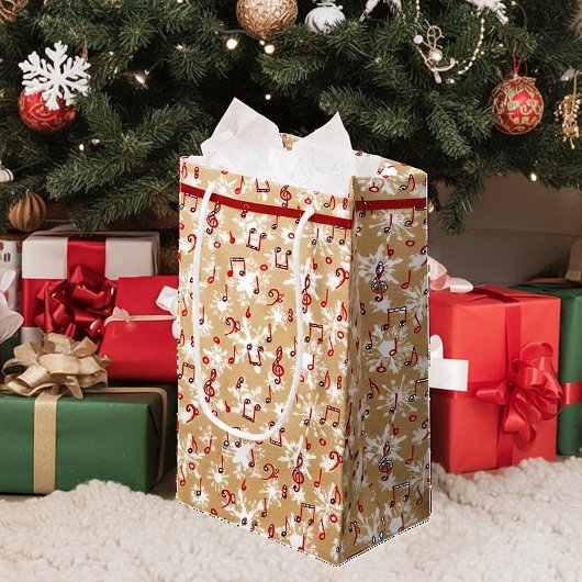 Rode muziek en sneeuw op papieren tas klein cadeauzakje