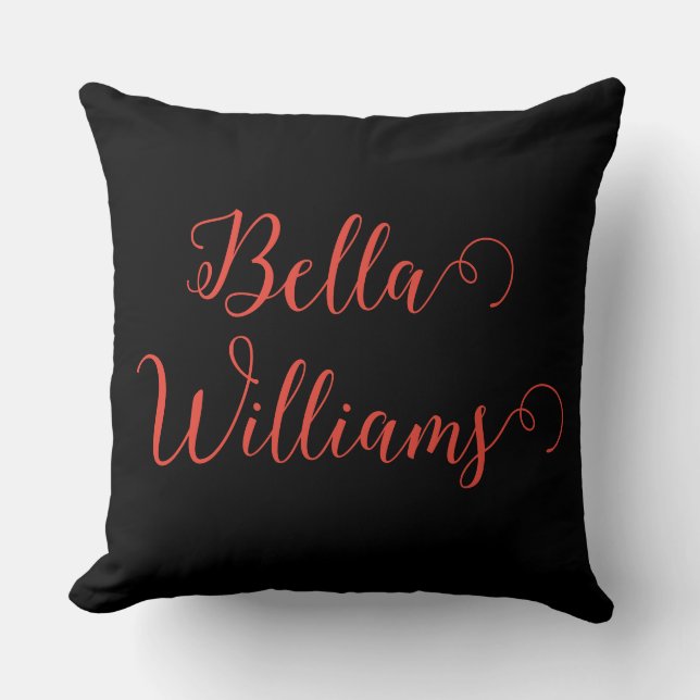 Rode noot op zwart kussen (Voorkant)