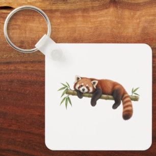 Rode panda rustend op bamboe sleutelhanger