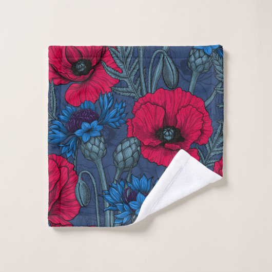 Rode papaver en blauwe cornbloemen op blauw bad handdoek (Wasdoekje)