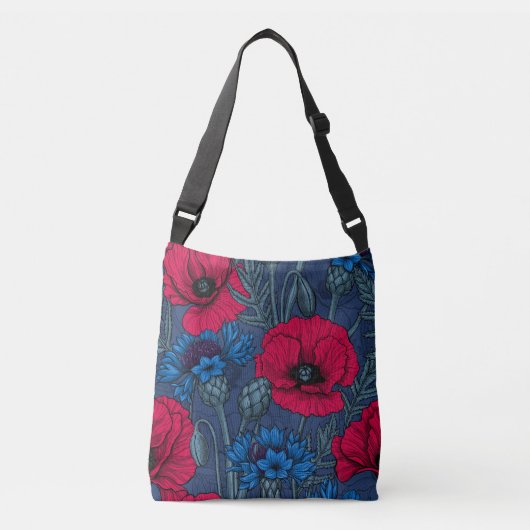 Rode papaver en blauwe cornbloemen op blauw crossbody tas (Voorkant)