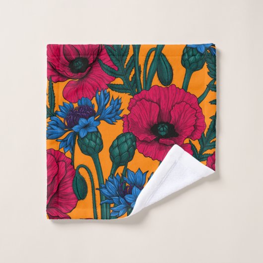Rode papaver en blauwe cornbloemen op sinaasappel bad handdoek (Wasdoekje)