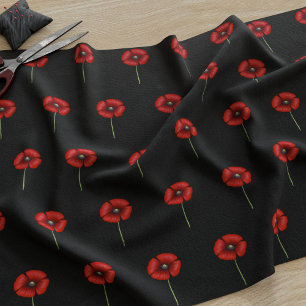 Rode papaverbloemen op zwart weefsel stof