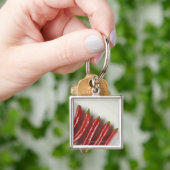 Rode paprika's sleutelhanger (Hand)
