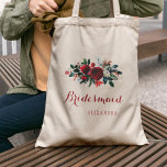 Rode pioen boeket winter bruiloft bruidsmeisje tote bag<br><div class="desc">Rustieke elegante bloemenbruiloft stijlvolle bruidsmeisje / meid van eer / bloemenmeisje canvas tas met een waterverf rode bordeaux en witte pioenen winterboeket met seizoensgebonden groene bir takken, rode bessen en gebladerte en wit uw aangepaste tekst. Vul uw gegevens in de spots in, U kunt ervoor kiezen om het verder aan...</div>