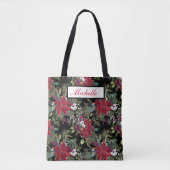 Rode poinsettia's en witte bloemen op zwart tote bag (Voorkant)