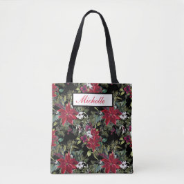 Rode poinsettia's en witte bloemen op zwart tote bag