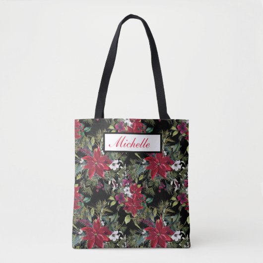 Rode poinsettia's en witte bloemen op zwart tote bag (Voorkant)