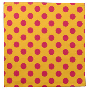 Rode polka-stippen op geel servet