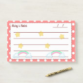Rode polka-stippen, schattige sterren en regenboge post-it® notes (Op bureau)