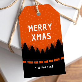 Rode retro Vrolijke Kerstmis met pijnbomen en snee Cadeaulabel