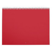 Rode, roze en oranje kledingstukken hangen naast e kalender (Hoes)