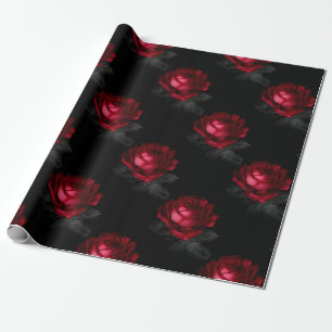 Rode rozen met grijze bladeren op zwart cadeaupapier