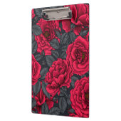 Rode rozen met grijze bladeren op zwart klembord (Links)