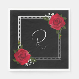 Rode rozen op het zwarte huwelijk servet