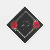 Rode rozen op het zwarte huwelijk servet (Hoek)