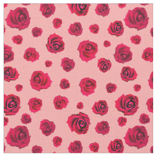 Rode rozen op roze stof