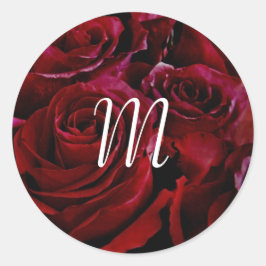 Rode rozen rondom initiaal ronde sticker
