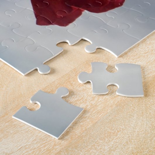 Rode rozen tegen een heldere blauwe hemel legpuzzel (Zijkant)