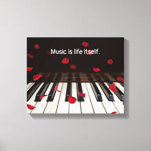Rode rozenblaadjes op piano met citaat canvas afdruk