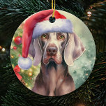 Rode Santa Hat Weimaraner Hondenkerst Keramisch Ornament<br><div class="desc">Infundeer feestelijke flair in uw vakantiedecor met onze Red Santa Hat Weimaraner Dog Christmas Ceramic Ornament. Dit charmante ornament heeft een heerlijke Weimaraner versierd met een levendige rode kerstmuts, die een uniek tintje geeft aan uw seizoensgebonden festiviteiten. Dit handgemaakte keramische ornament is een ideaal geschenk voor elke Weimaraner-liefhebber of trotse...</div>