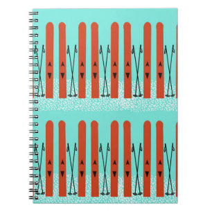 Rode ski's op blauw notitieboek
