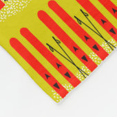 Rode ski's op geel fleece deken (Hoek)