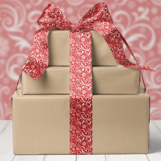 Rode sneeuwvlokken en kerstswirls satijnen lint