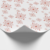 Rode sneeuwvlokken op wit inpakpapier (Hoek)