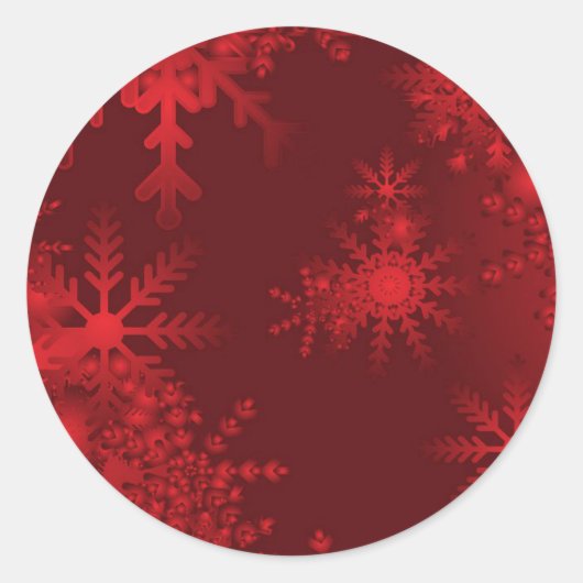Rode sneeuwvlokken ronde sticker (Voorkant)