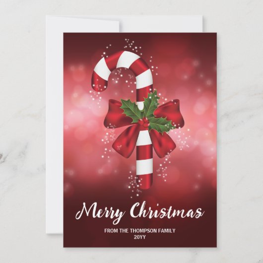 Rode snoepriet op een achtergrond van een rode keh feestdagenkaart (Voorkant)