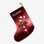 Rode snoepriet op een achtergrond van een rode keh kleine kerstsok (Achterkant (Hangend))