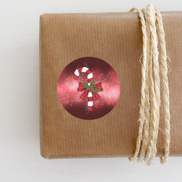 Rode snoepriet op een achtergrond van een rode keh ronde sticker