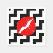 Rode spoelen op zwarte en witte zigzag servet (Voorkant)