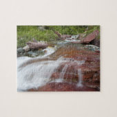 Rode steen in Baring Creek in Glacier National Legpuzzel (Horizontaal)