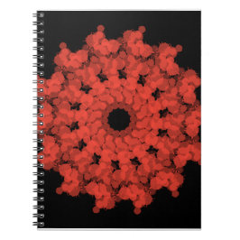 Rode ster explosie aan zwarte hemel notitieboek
