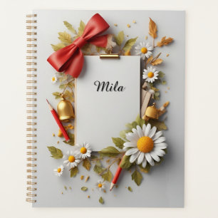 Rode strik, gouden bel en decoratieve elementen planner