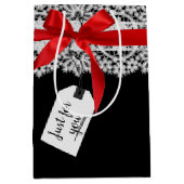 Rode strik op kant medium cadeauzakje (Voorkant)