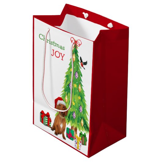 Rode teckel Hond Kerstman Hoed en kerstboom Medium Cadeauzakje (Voorkant Gekanteld)