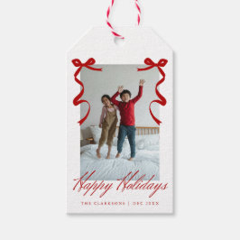 Rode vakantiehand getrokken grillige strikken cadeaulabel